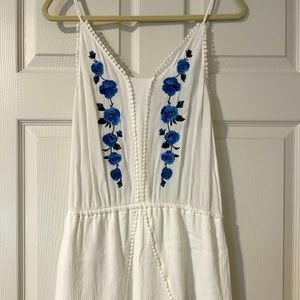 Blue floral accented linen-style romper